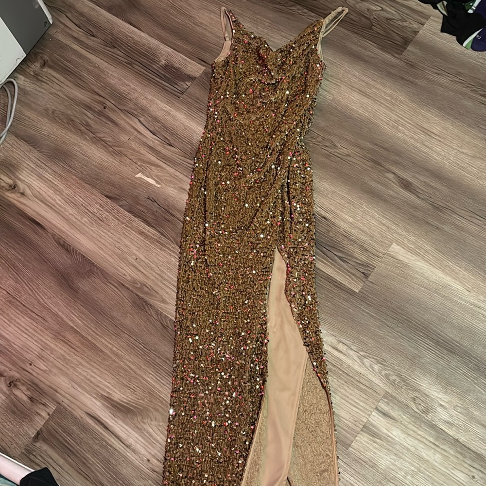 It’s a size small long sequence dress